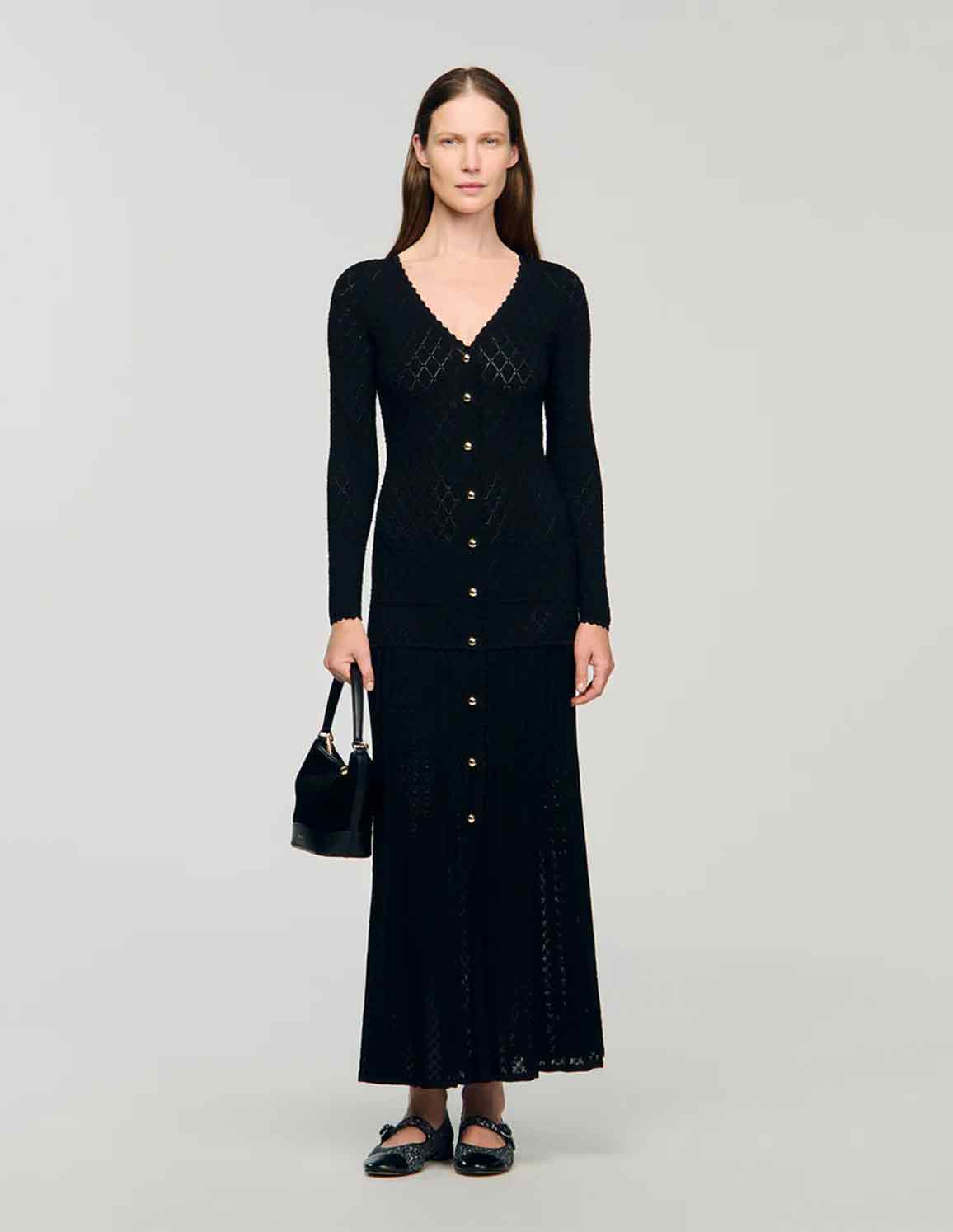 black sandro dress Mini Knit with Ruffle It is composed of 53% viscose Immediately purchased this dress as
